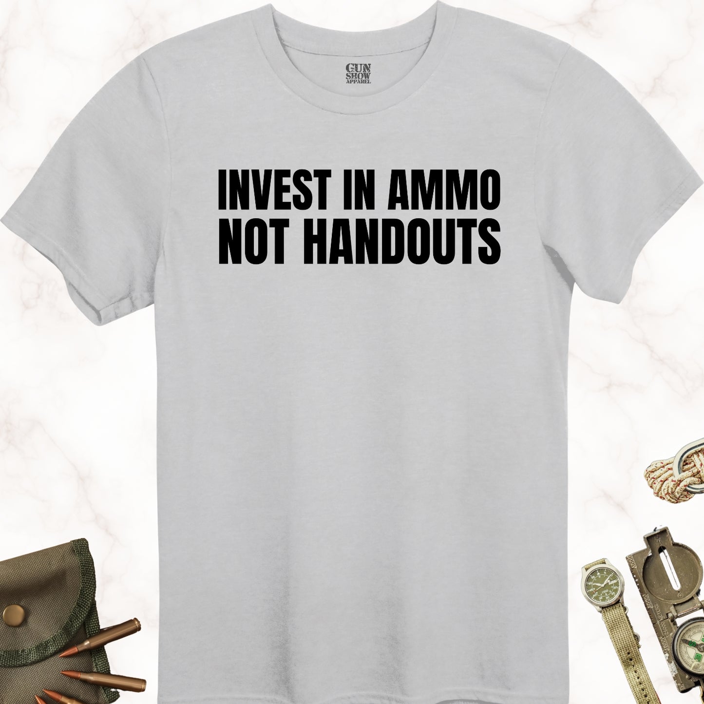 Invest In Ammo Not Handouts Shirt in color Icy Grey with black design from Gun Show Apparel