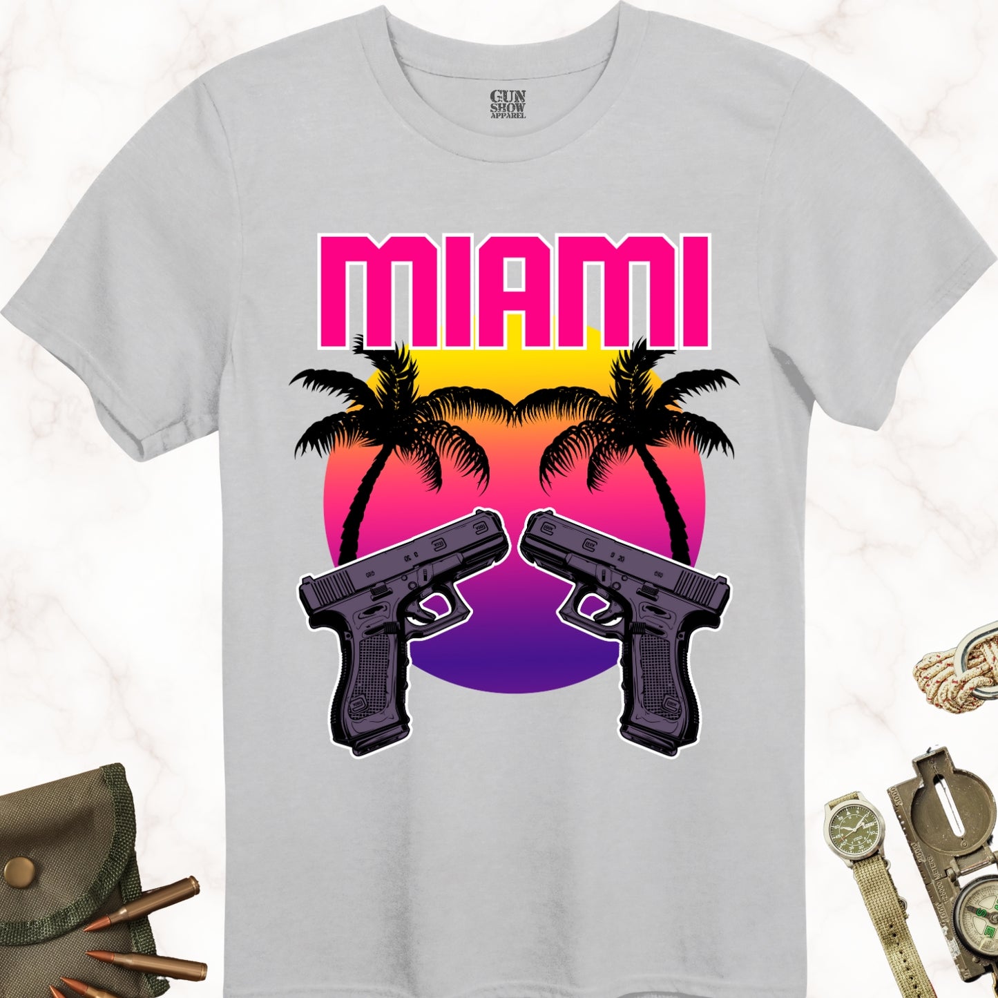 Miami Sunset Gun T-Shirt with Palm Trees and Dual Pistols in color Ice Grey