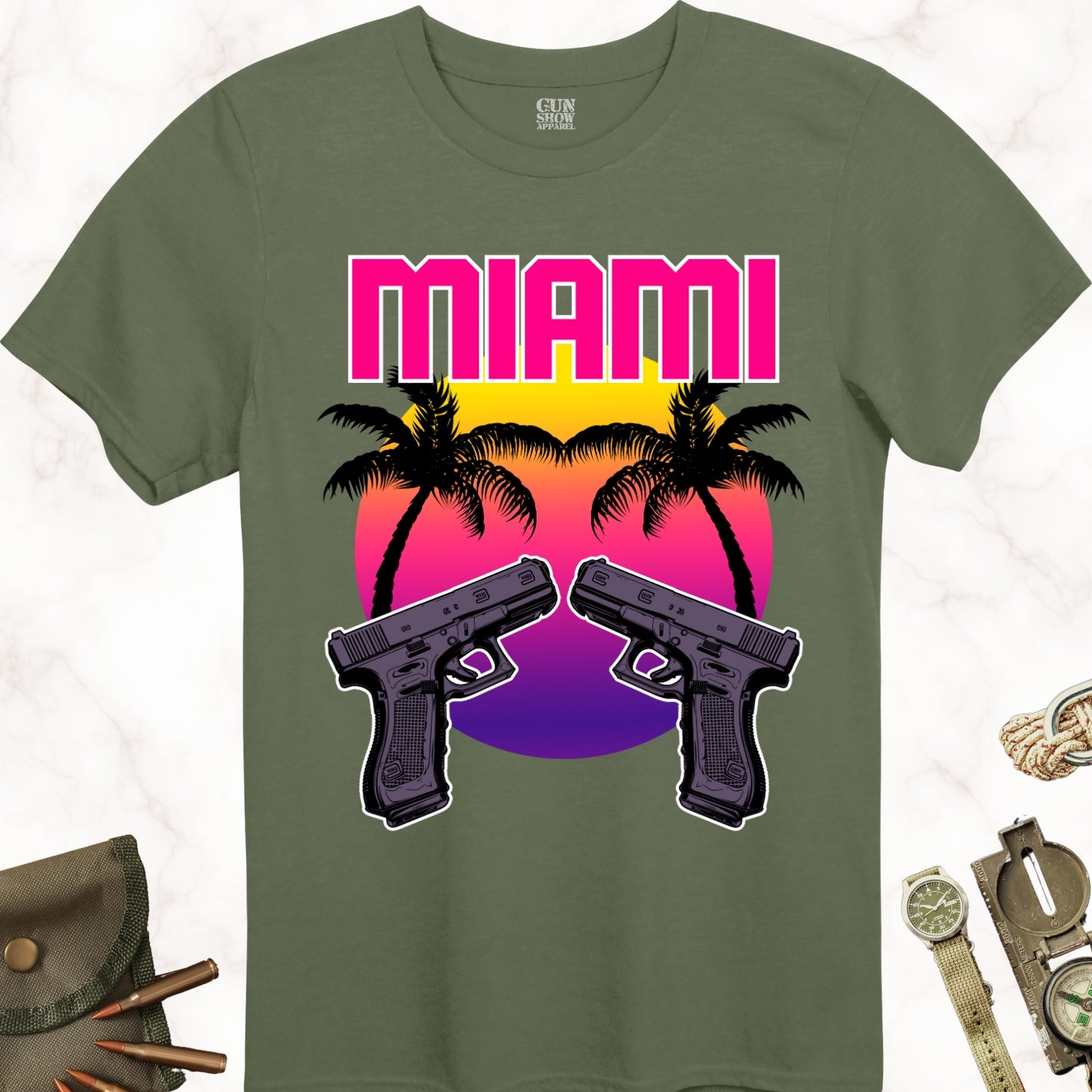 Miami Sunset Gun T-Shirt with Palm Trees and Dual Pistols in color Military Green