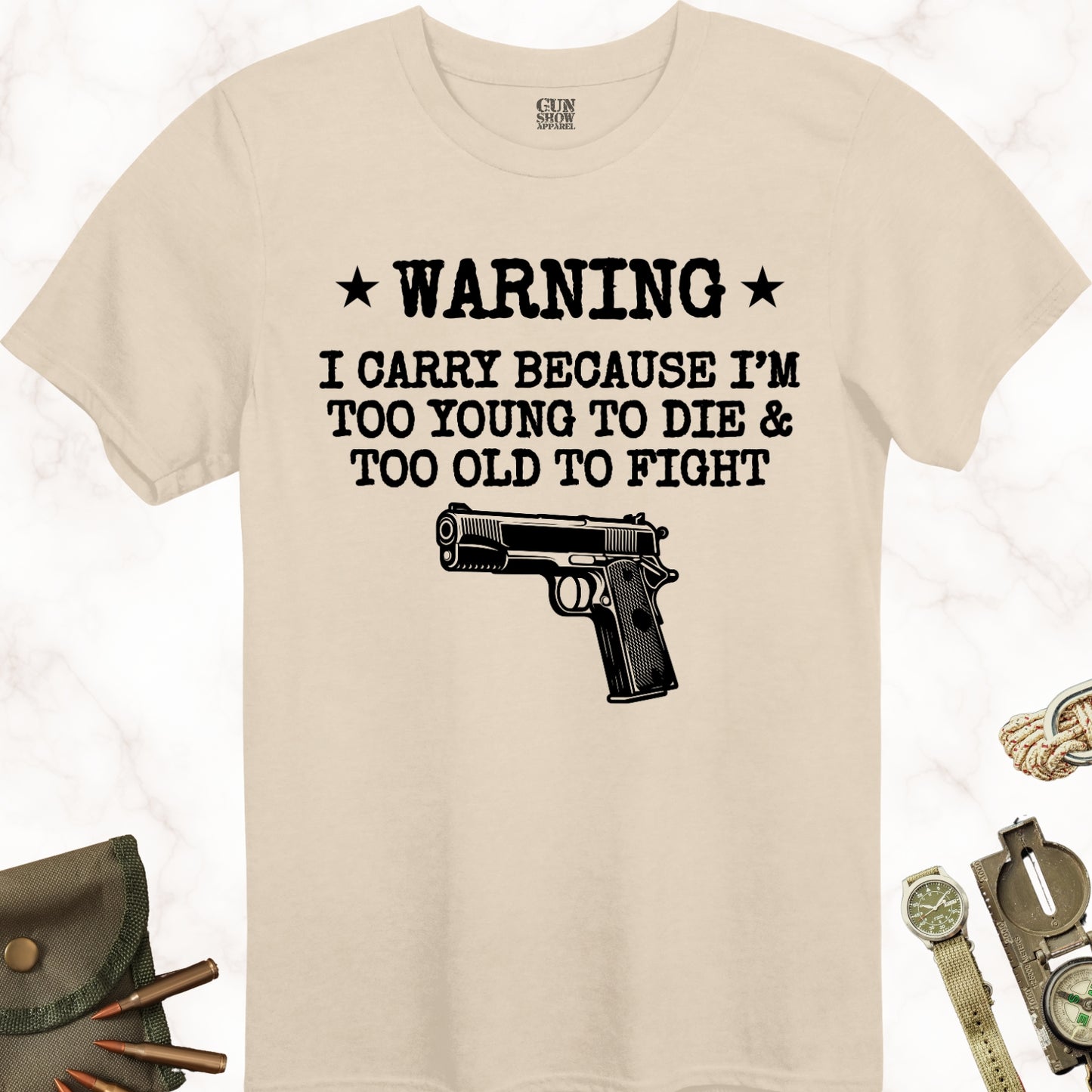 Warning I Carry Because I'm Too Young To Die and Too Old To Fight T-Shirt in color Sand